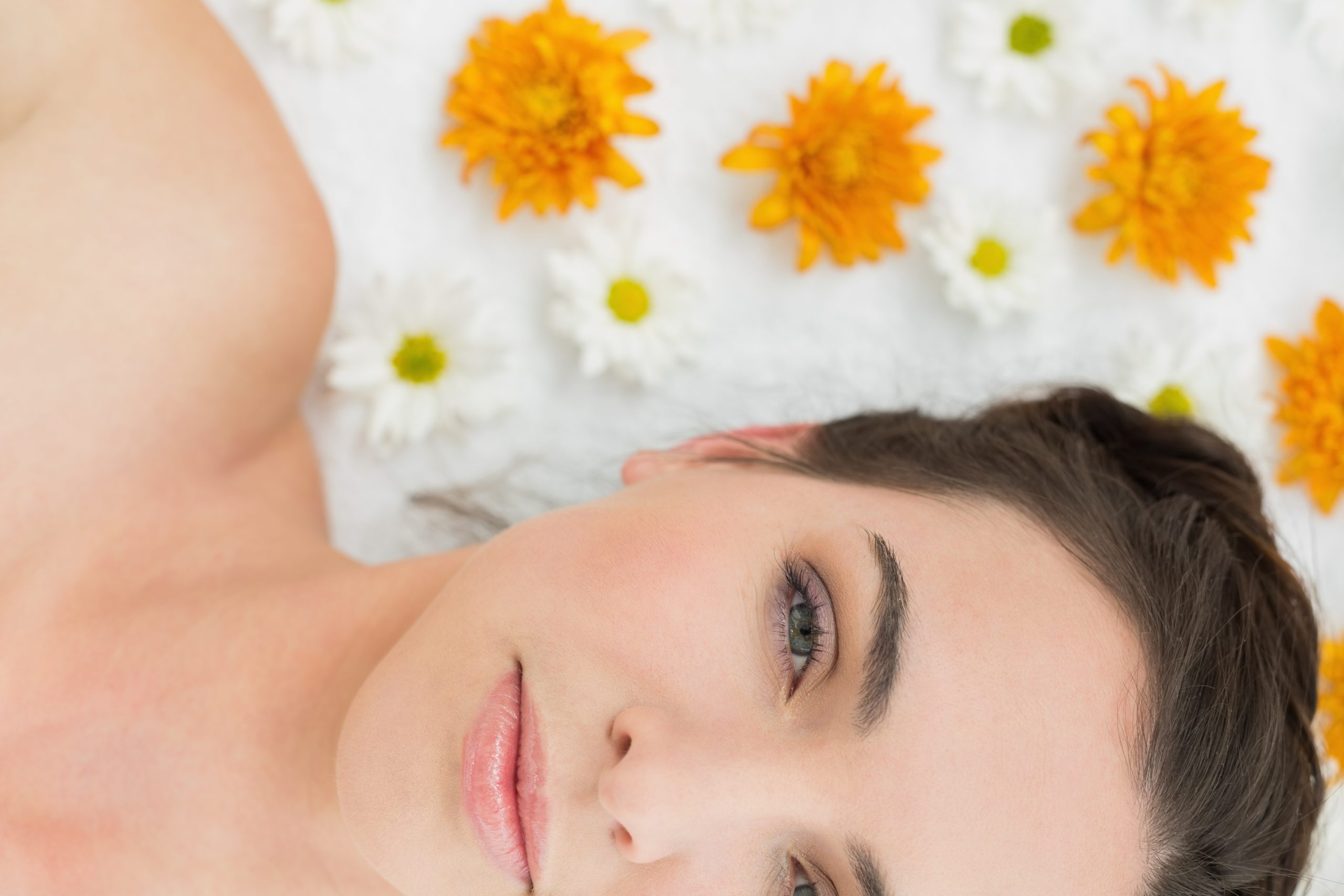 beautiful-young-woman-with-flowers-beauty-salon